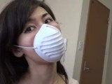 CUTE ASIAN WOMAN WEARS SURGICAL MASKS FOR YOU